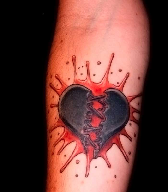 Tatuajes de corazón sangrando