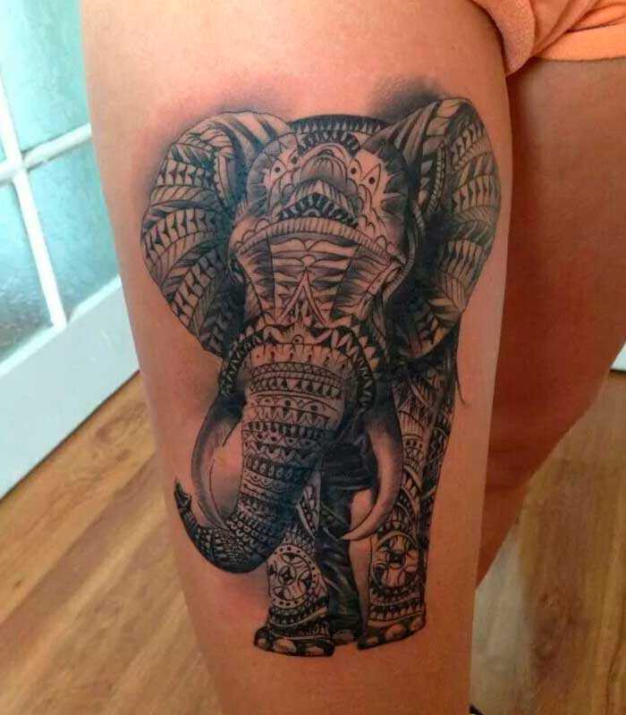 tatuajes de elefantes en la pierna