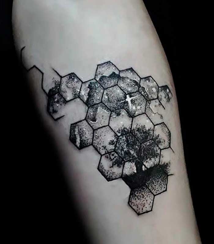 tatuajes geometricos en el brazo y antebrazo