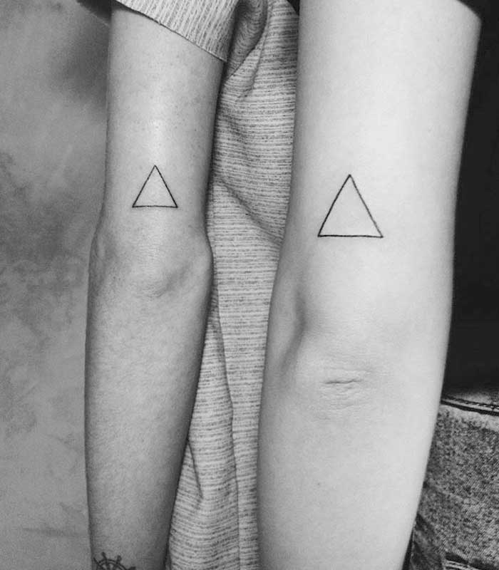 Tatuajes de triangulos en el brazo
