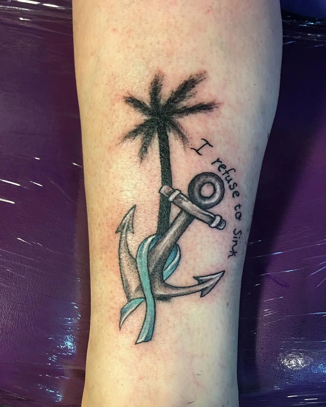 anclas y palmeras tattoos