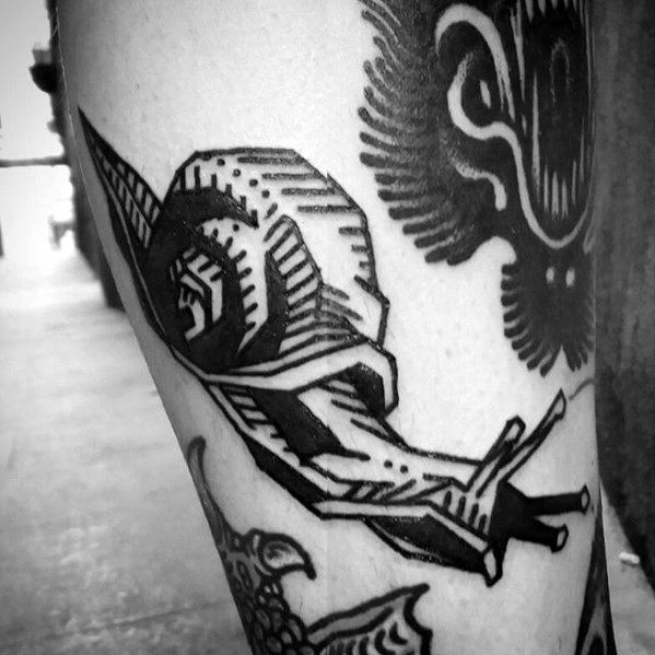 tattoos de caracoles para hombres