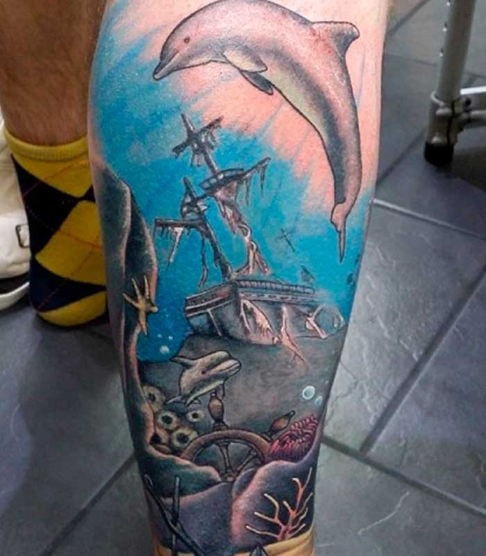 tattoos de delfines para caballeros