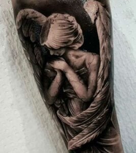 tatuajes de angeles en el brazo
