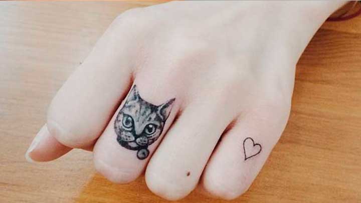tatuajes de animales en los dedos y manos