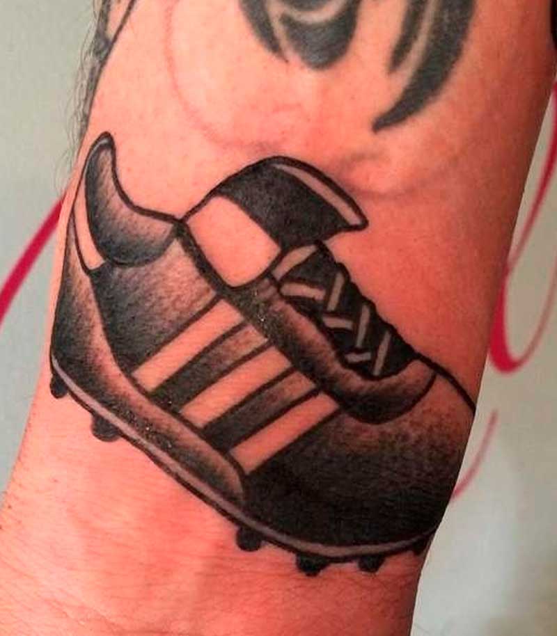 tatuajes de botas de futbol