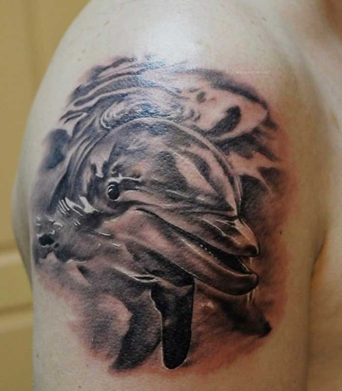tatuajes de delfines en blanco y negro