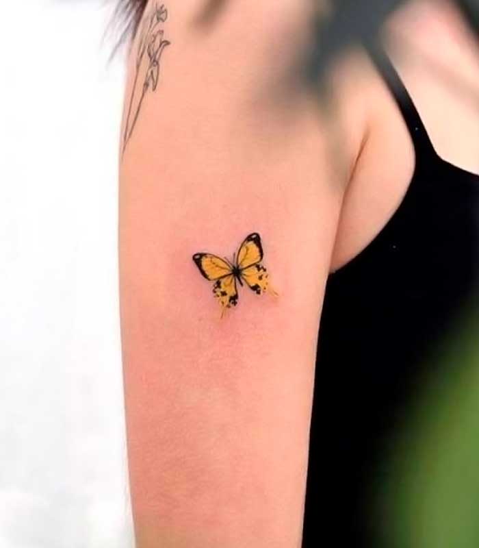 tatuajes de mariposas amarillos