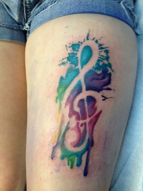 tatuajes de musica en la pierna