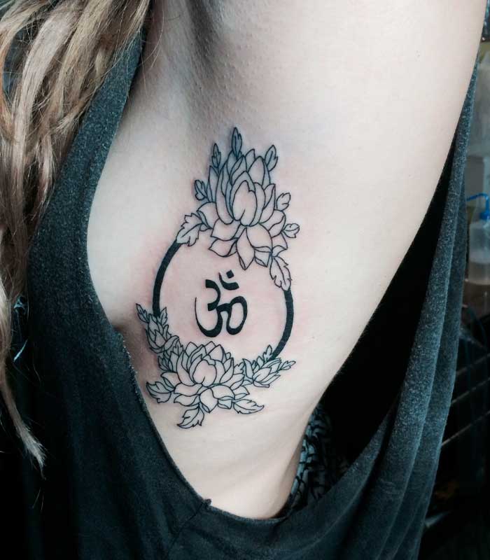 tatuajes de om y flor de loto