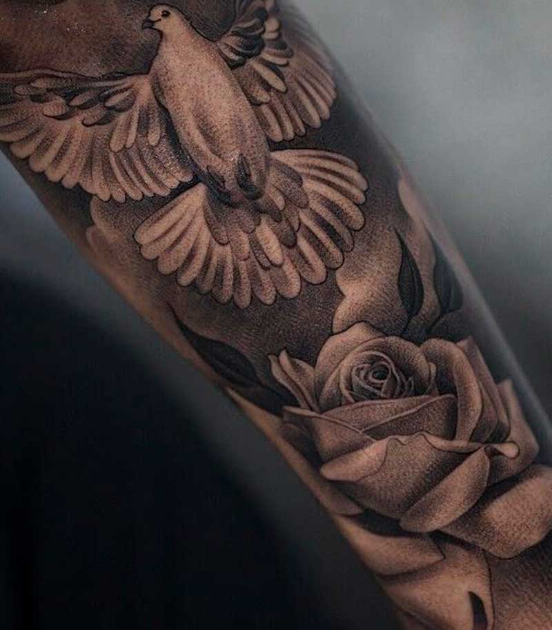 tatuajes de palomas para hombres 28
