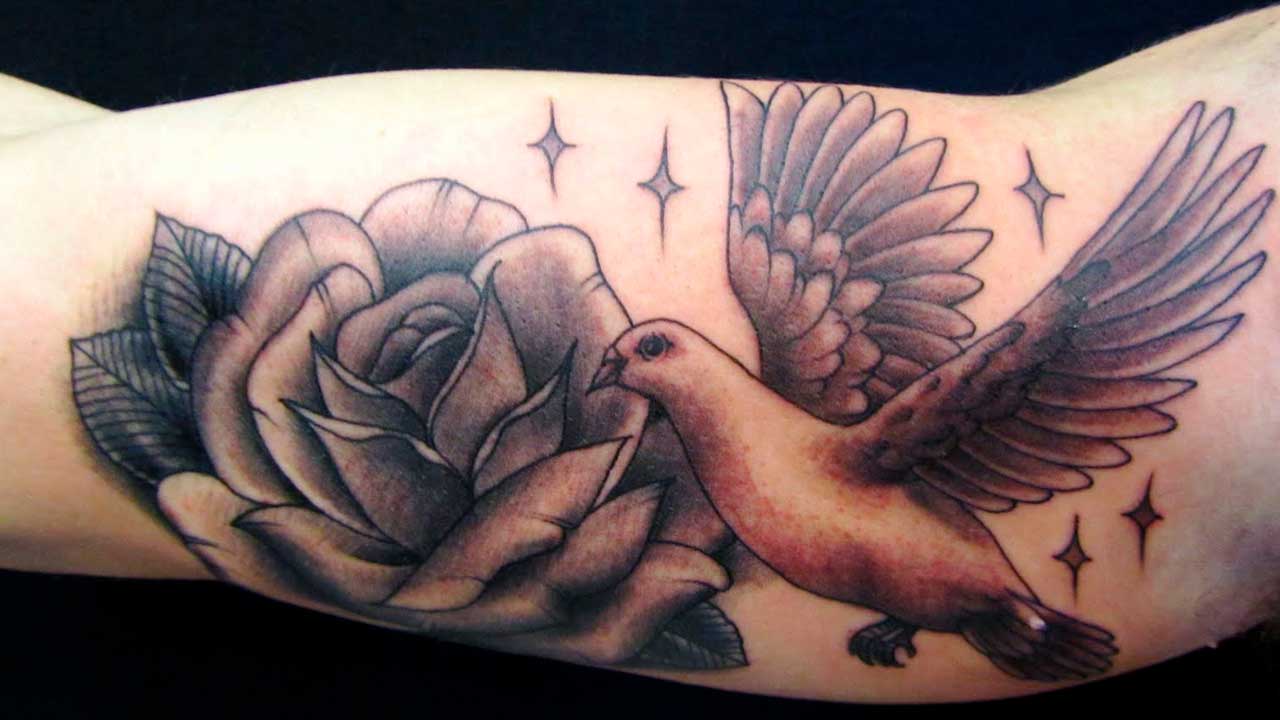 tatuajes de palomas para mujeres 16