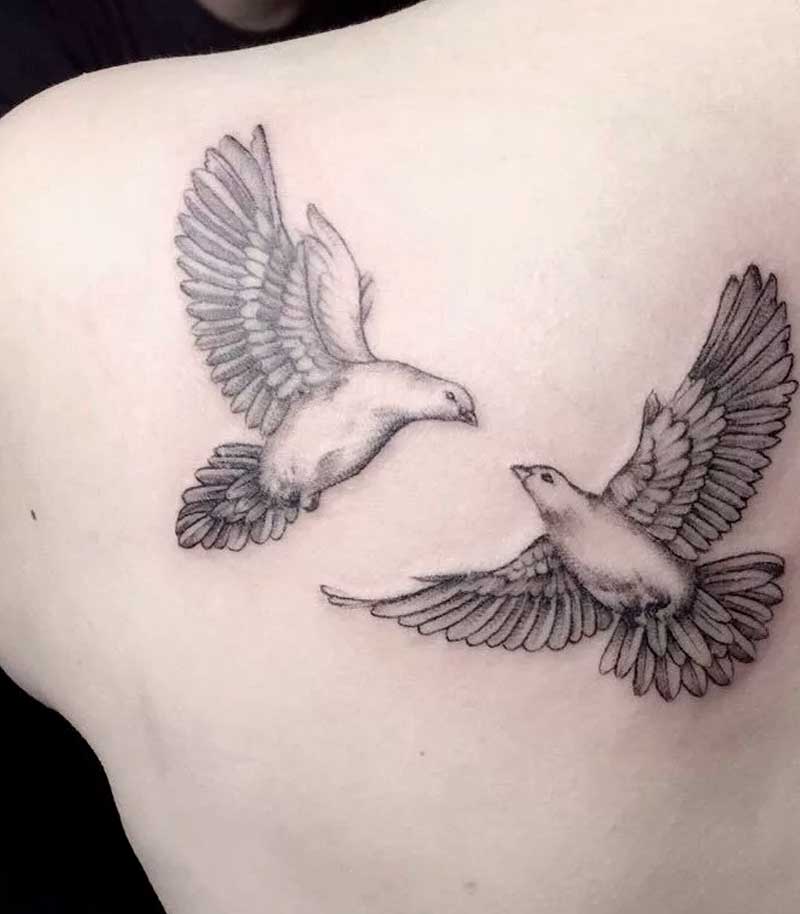 tatuajes de palomas para mujeres 7