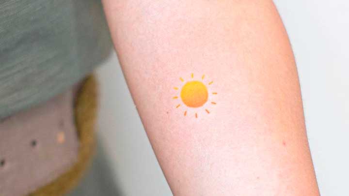 tatuajes de sol amarillo