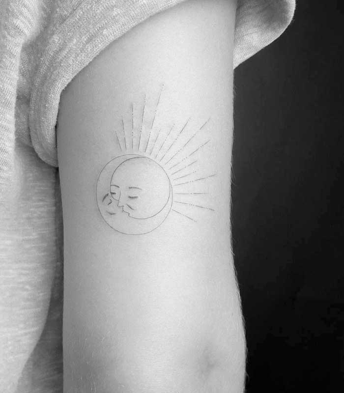 tatuajes de sol y luna en el brazo