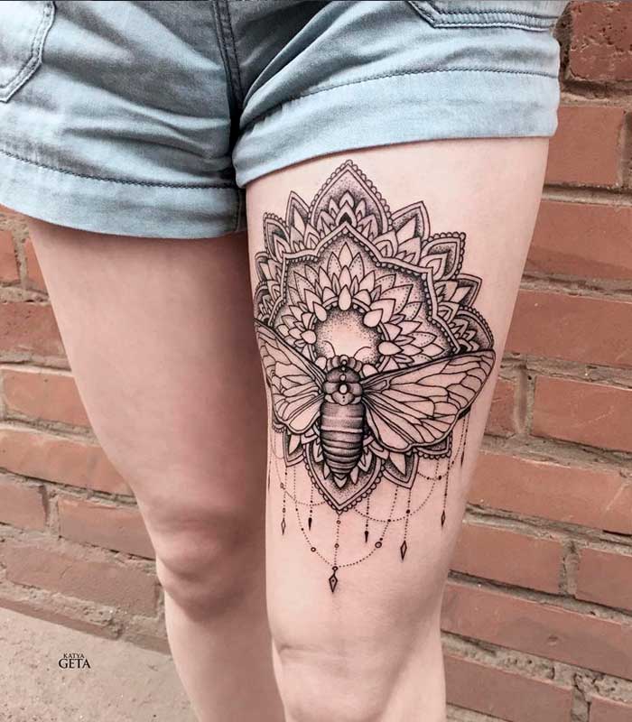 tatuajes mandalas en la pierna
