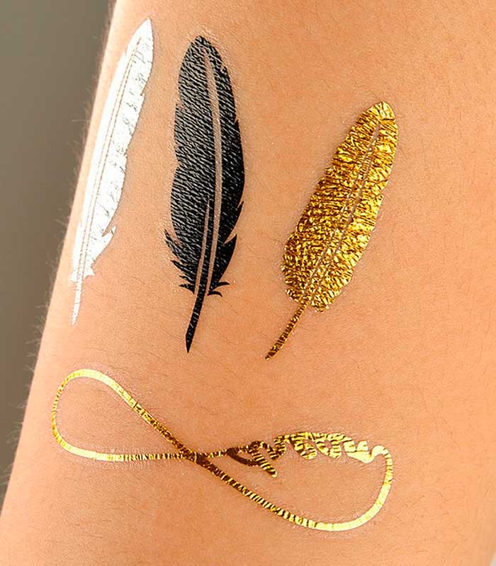 tatuajes plateados dorados y negros