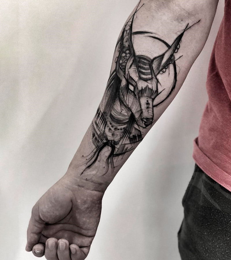 tatuajes de anubis en el brazo 6