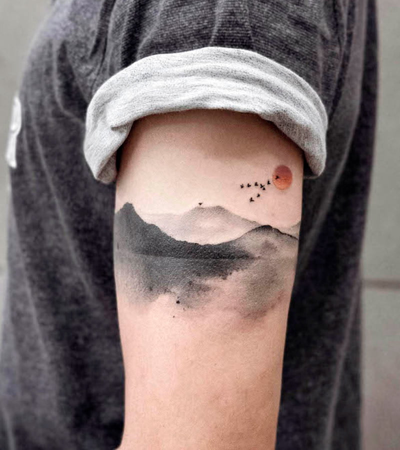 tatuajes de paisajes en el brazo 1
