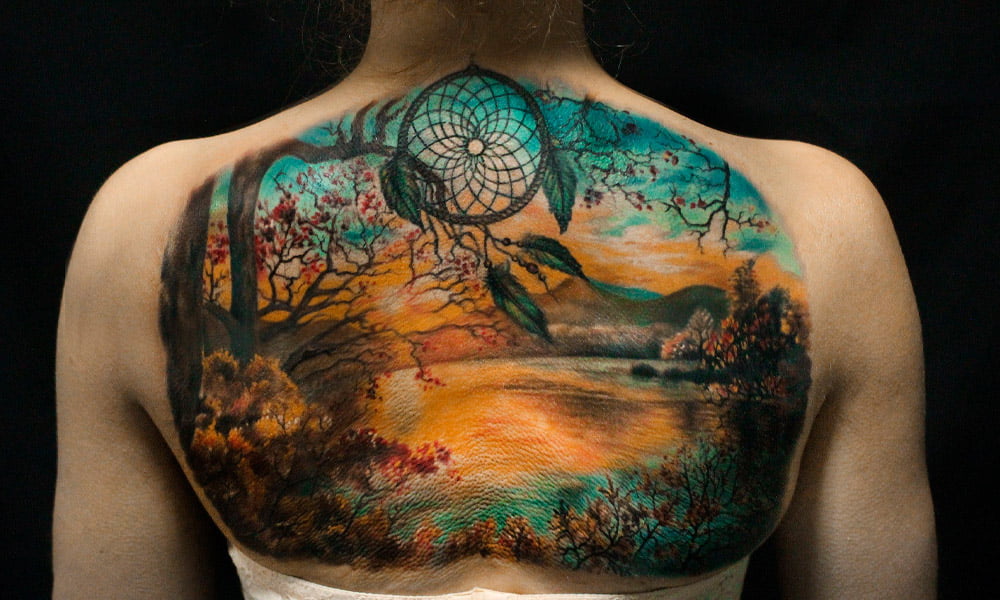 tatuajes de paisajes en la espalda 7