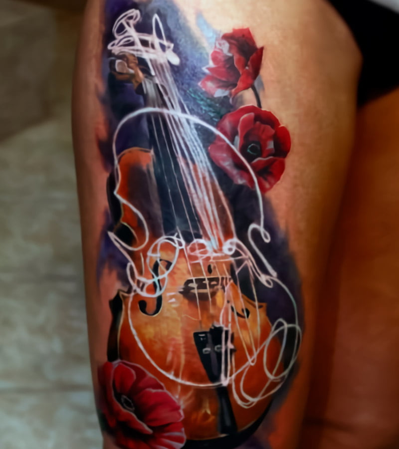 tatuajes de violin en la pierna 2