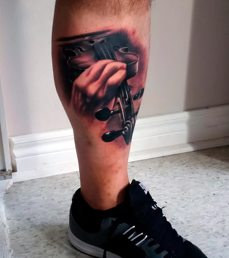 tatuajes de violin en la pierna 3