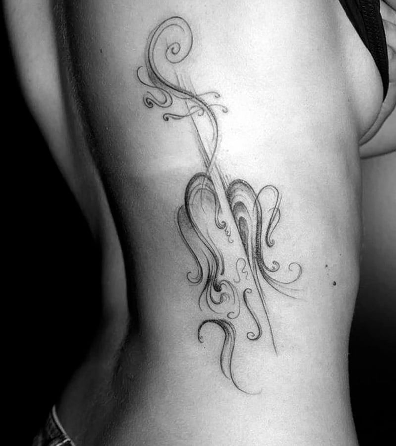 tatuajes de violin para mujeres 10