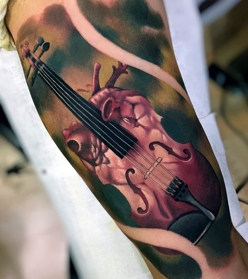 tatuajes de violin para mujeres 6