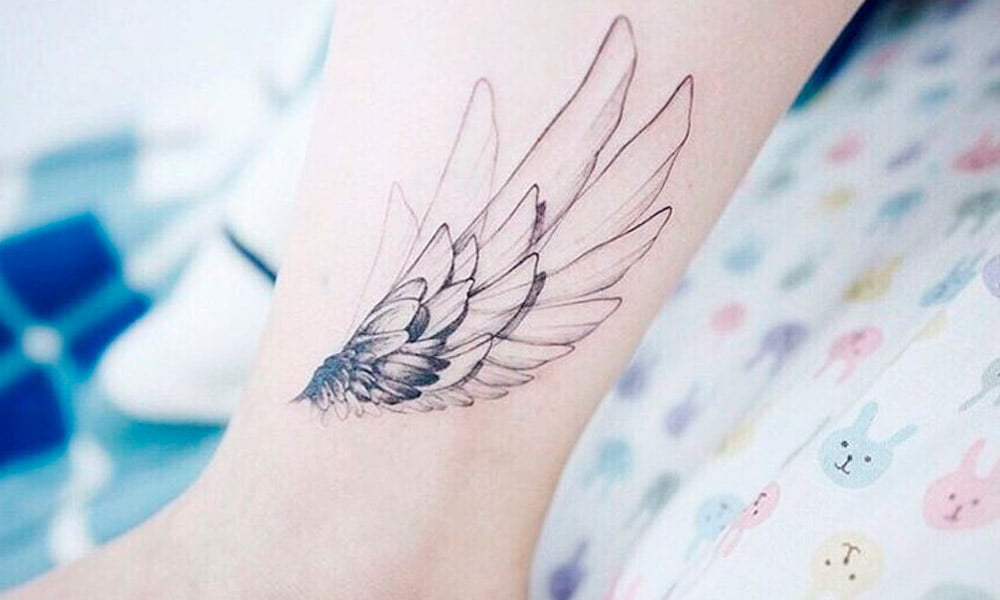 tatuajes minimalistas de alas de angel 6