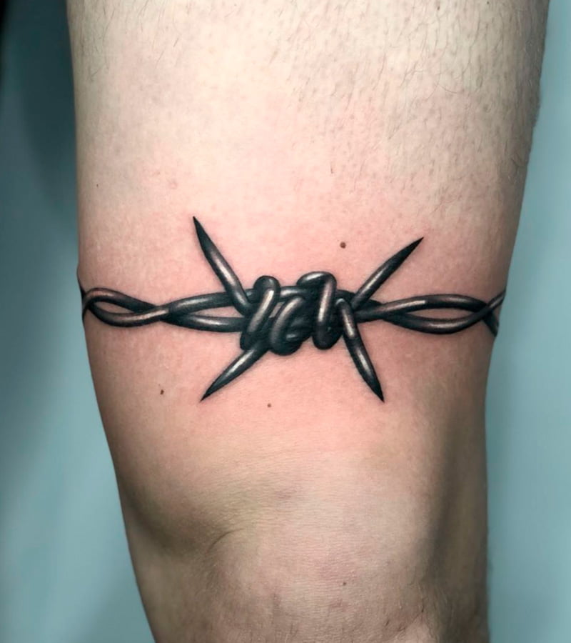 tatuajes de alambre de puas en la pierna 2