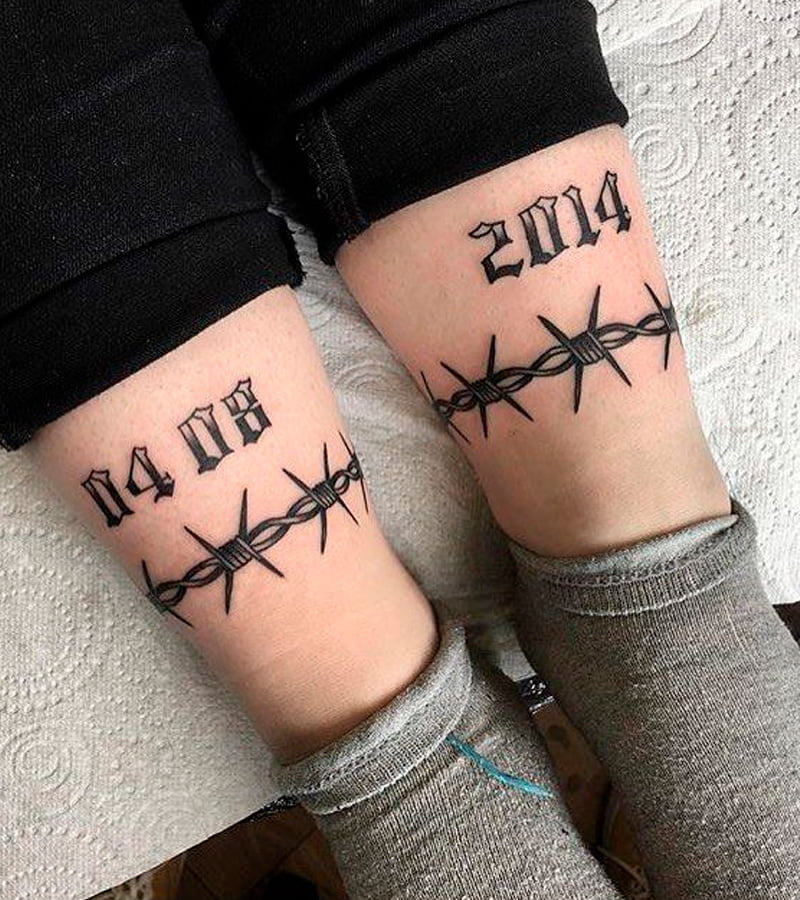 tatuajes de alambre de puas en la pierna 6