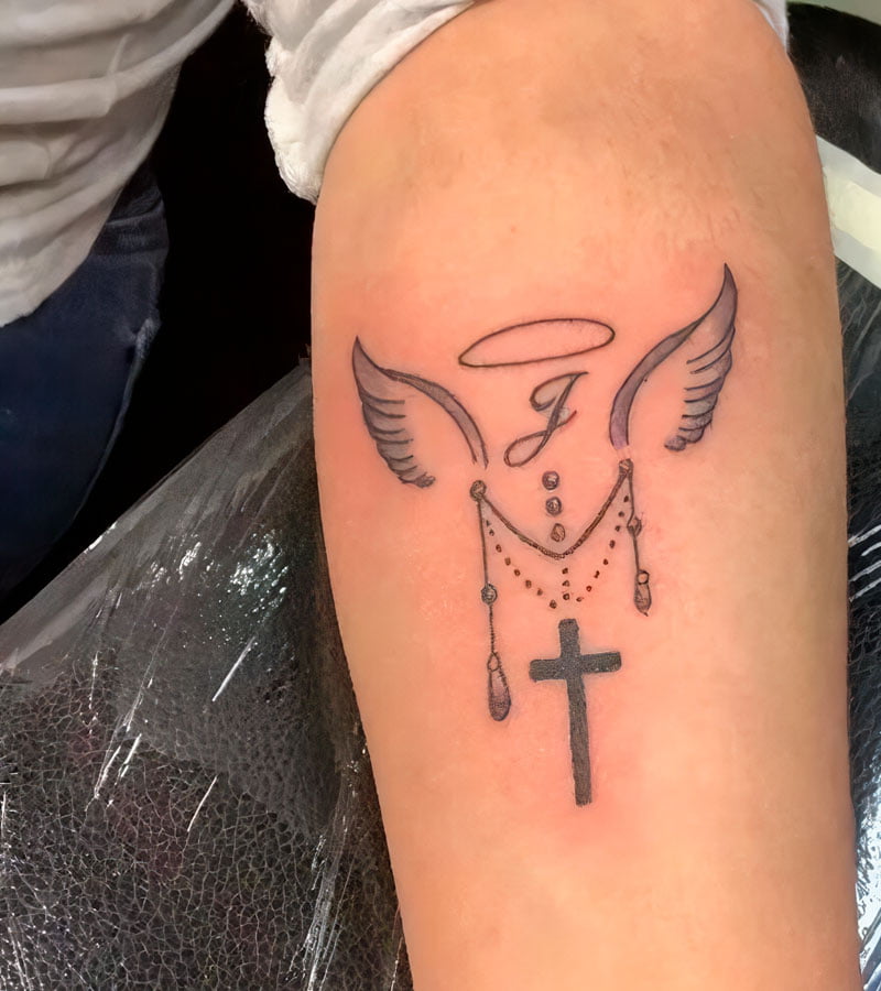 tatuajes de alas con cruz 2