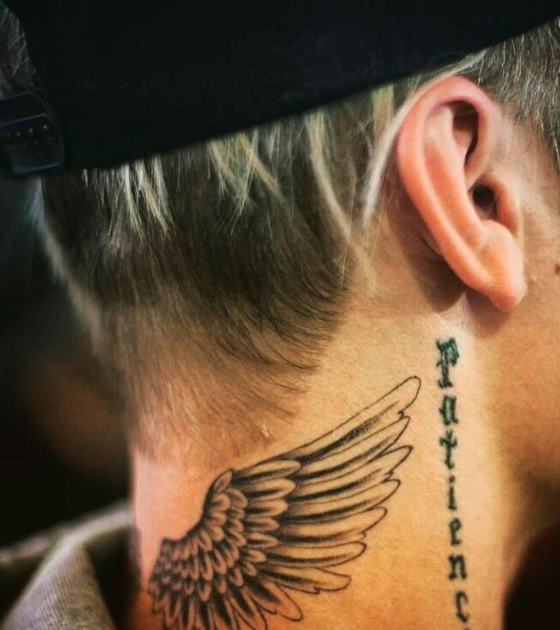tatuajes de alas en el cuello 2