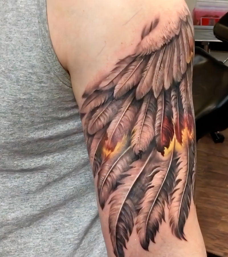 tatuajes de alas para hombres 12