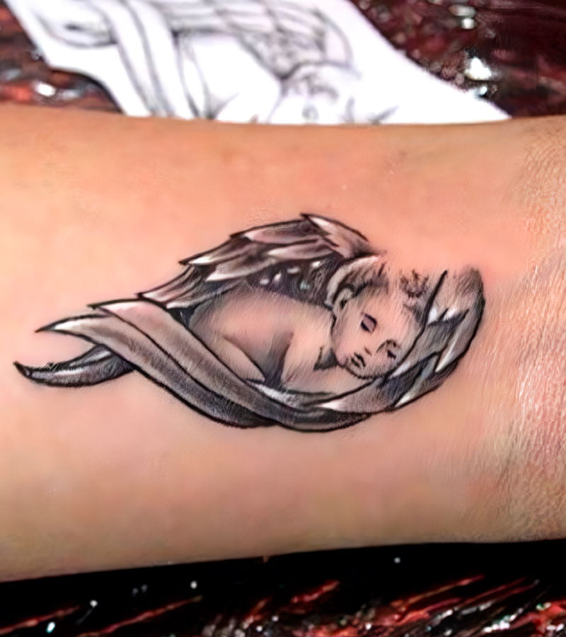 tatuajes de bebes con alas 8
