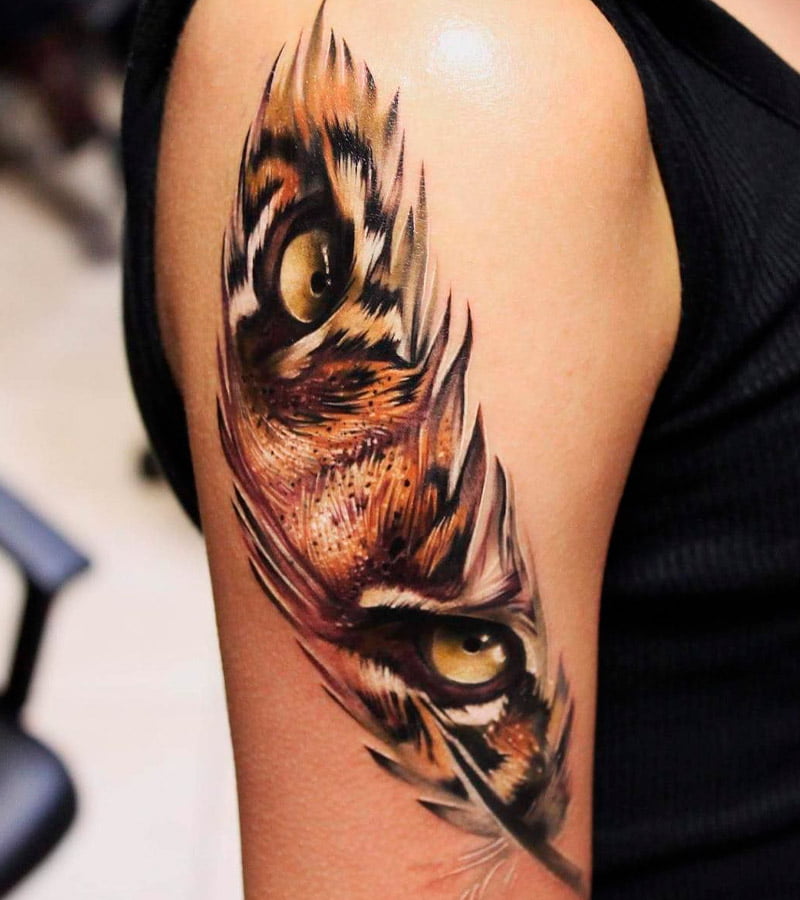 tatuajes de ojos de tigre en forma de pluma 1